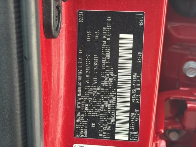 Used 2024 Barcelona Red Metallic Toyota LE image 29