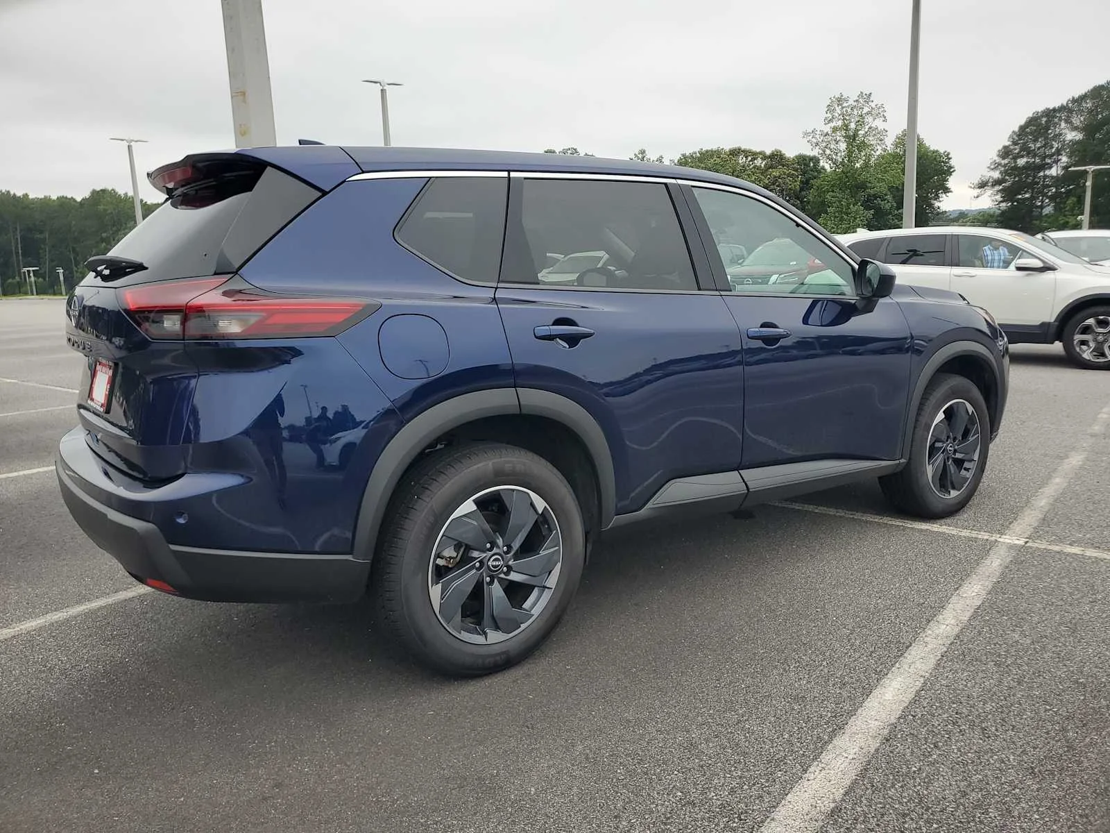 Used 2025 Deep Ocean Blue Pearl Nissan SV image 6