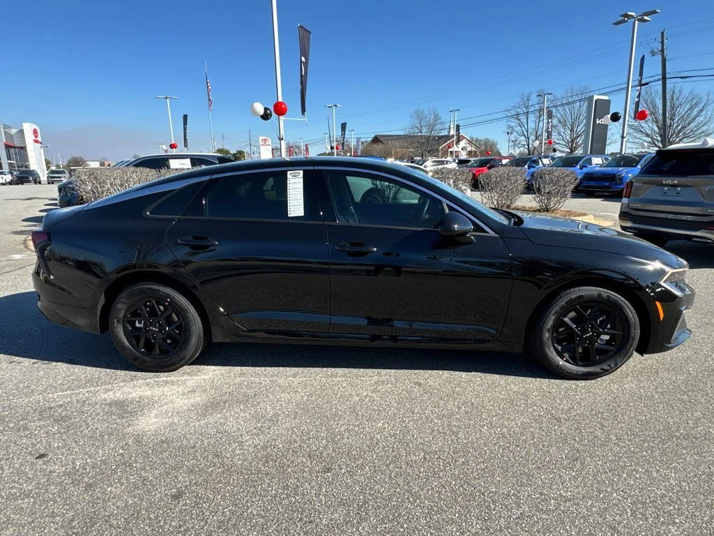 New 2026 Black Kia LXS image 8