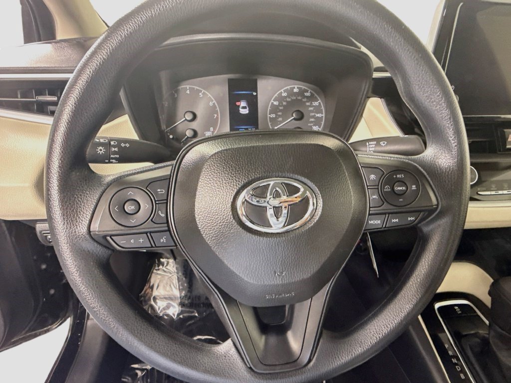Used 2023 Midnight Black Metallic Toyota LE image 9