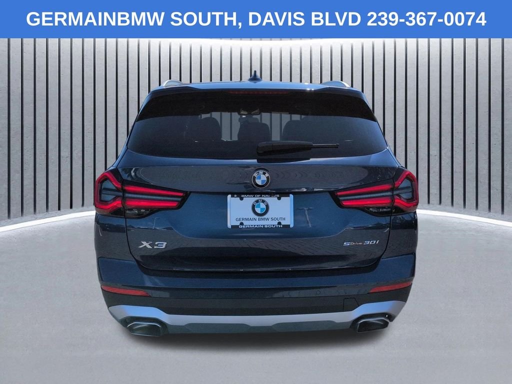 Certified Used 2022 Blue Metallic BMW sDrive30i image 6