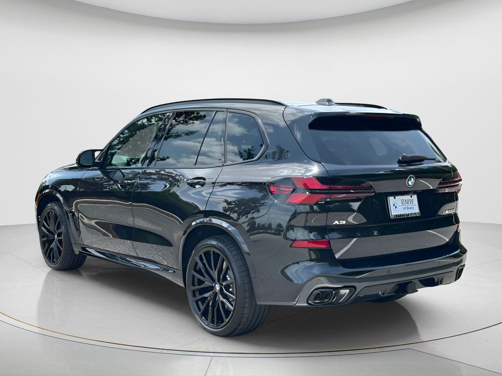 New 2026 Black Sapphire Metallic BMW M60i image 7