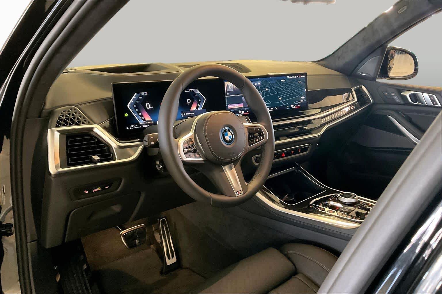 New 2026 Black Sapphire Metallic BMW xDrive50e image 8