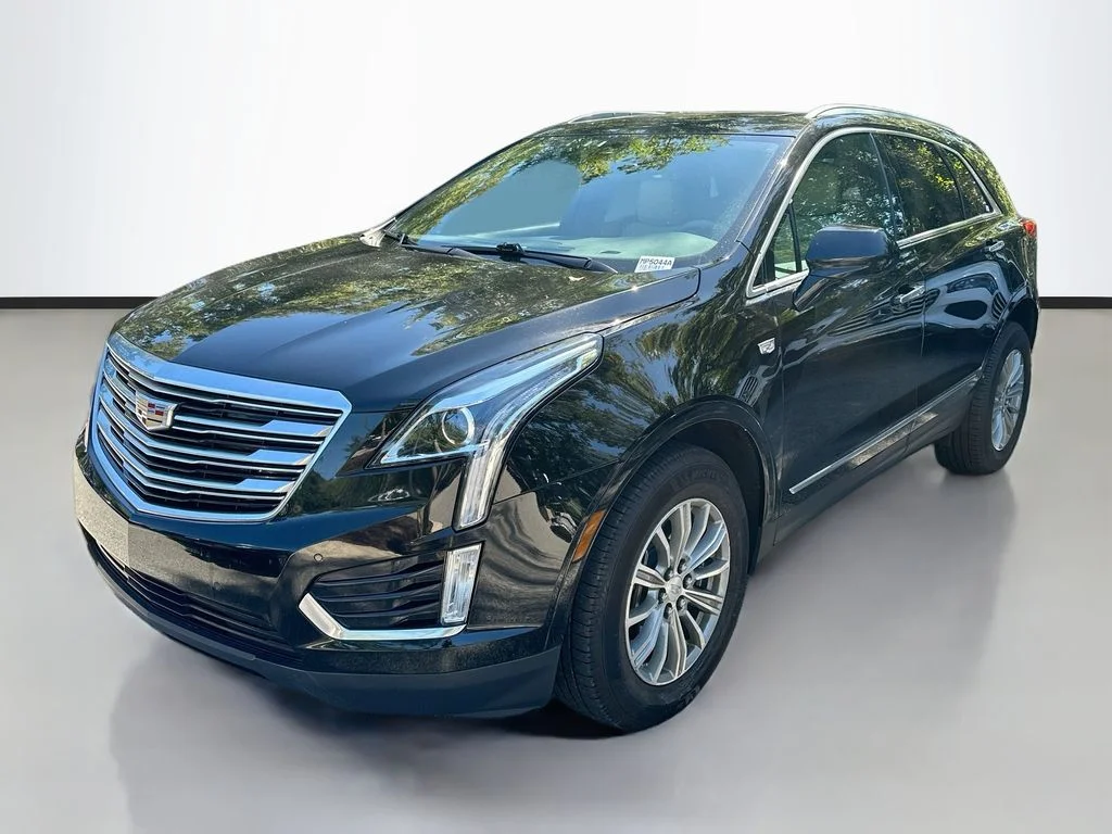 Used 2017 Black Metallic Cadillac Luxury image 1