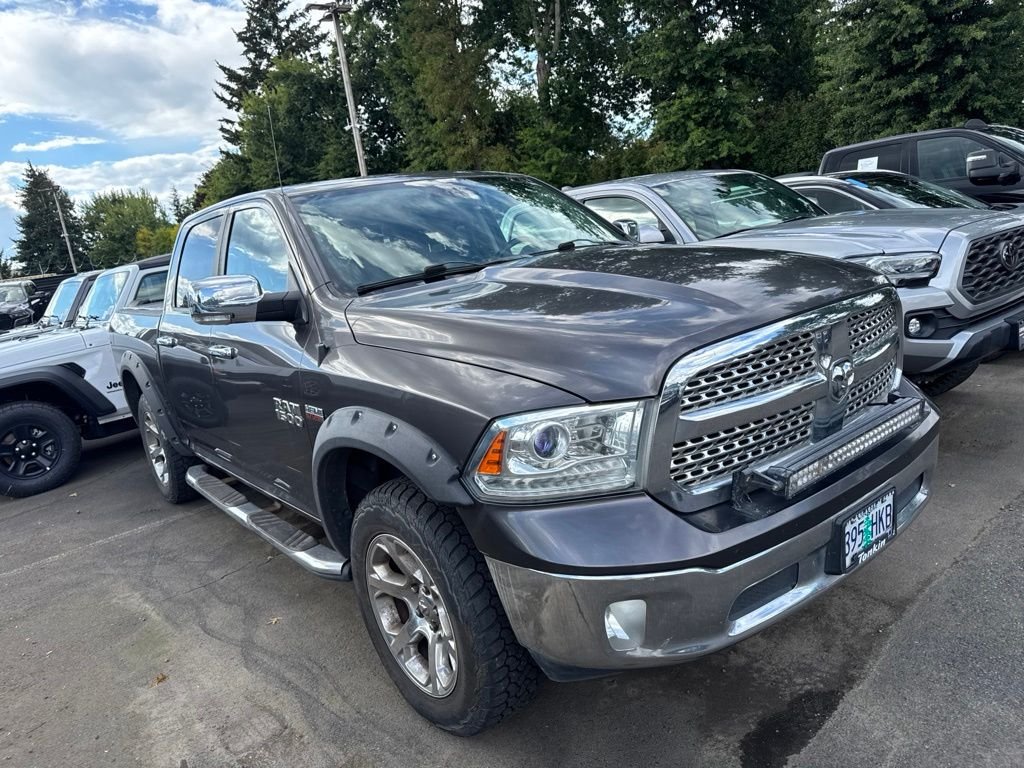 Used 2015 Granite Crystal Metallic Clearcoat Ram Laramie image 1