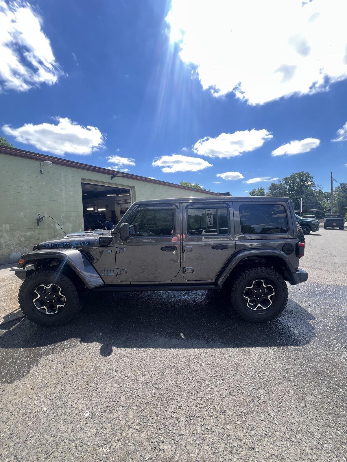 Used 2021 GRANITE CRYSTAL METALLIC CLEARCOAT JEEP UNLIMITED RUBICON image 6