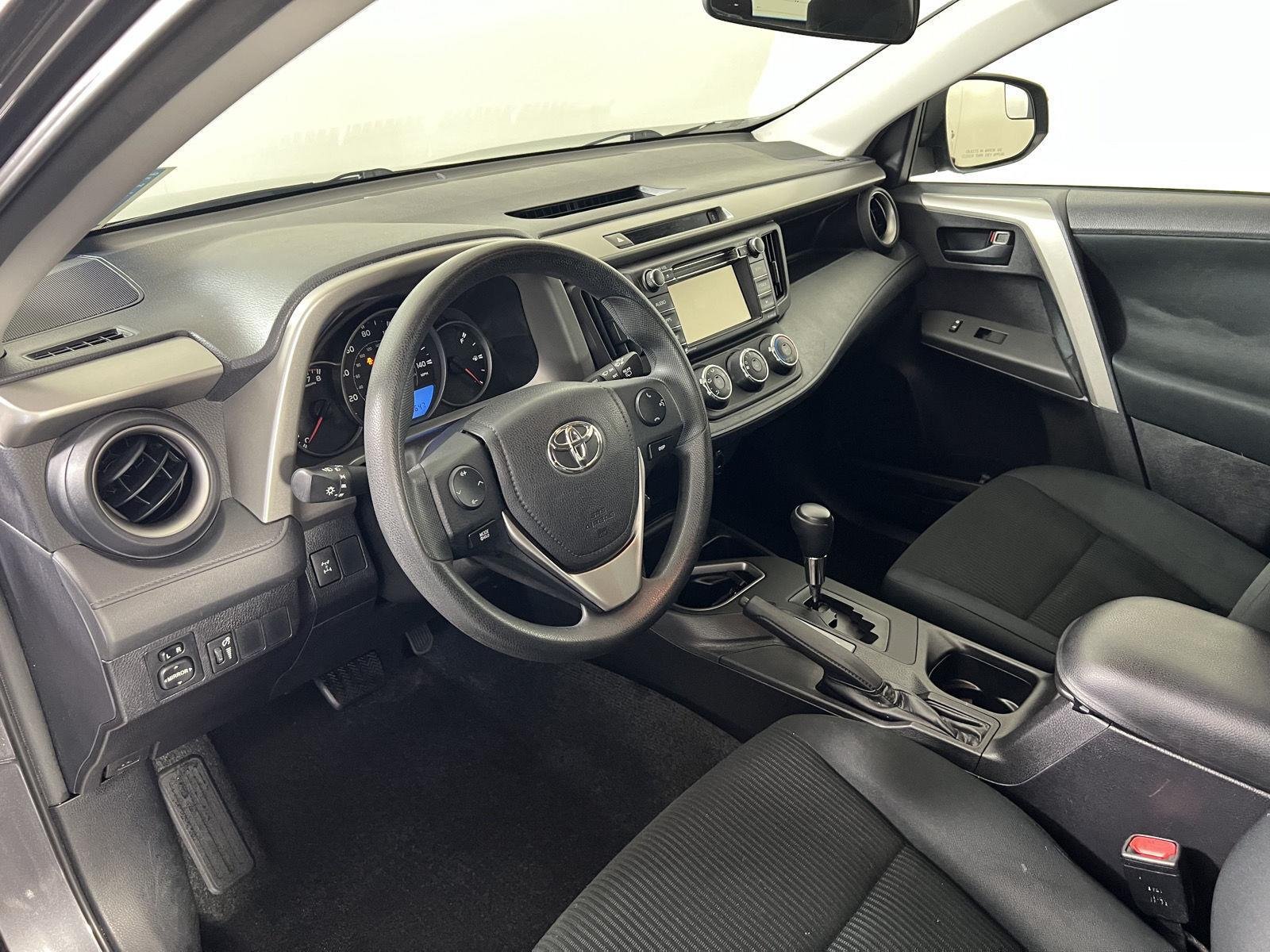 Used 2016 Magnetic Gray Metallic Toyota LE image 11