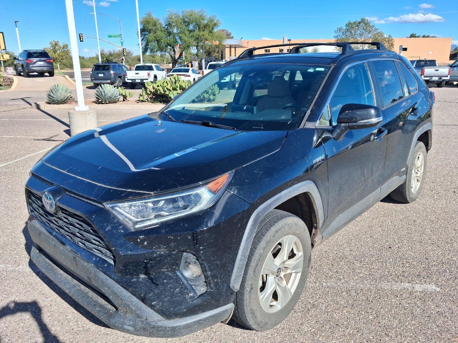 Used 2021 Midnight Black Metallic Toyota XLE image 1