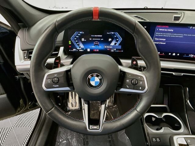 Used 2026 Black Sapphire Metallic BMW M35i image 11