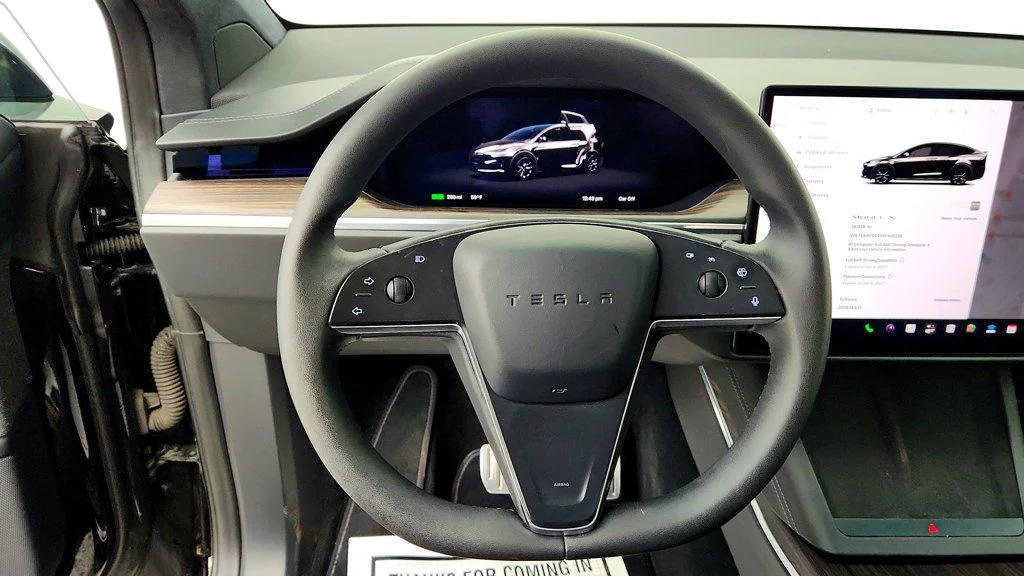 Used 2023 Solid Black Tesla AWD image 13