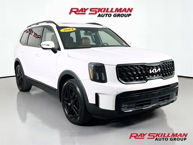Used 2024 White Kia SX-Prestige X-Line image 1