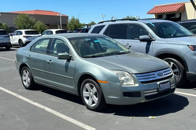 Used 2006 Titanium Green Metallic Ford SE image 2