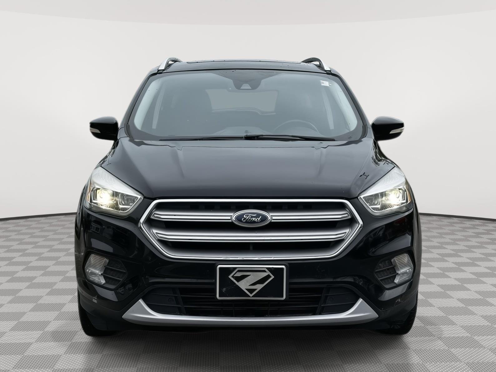 Used 2017 Ford Escape Titanium with VIN 1FMCU9J99HUB33889 for sale in Kansas City