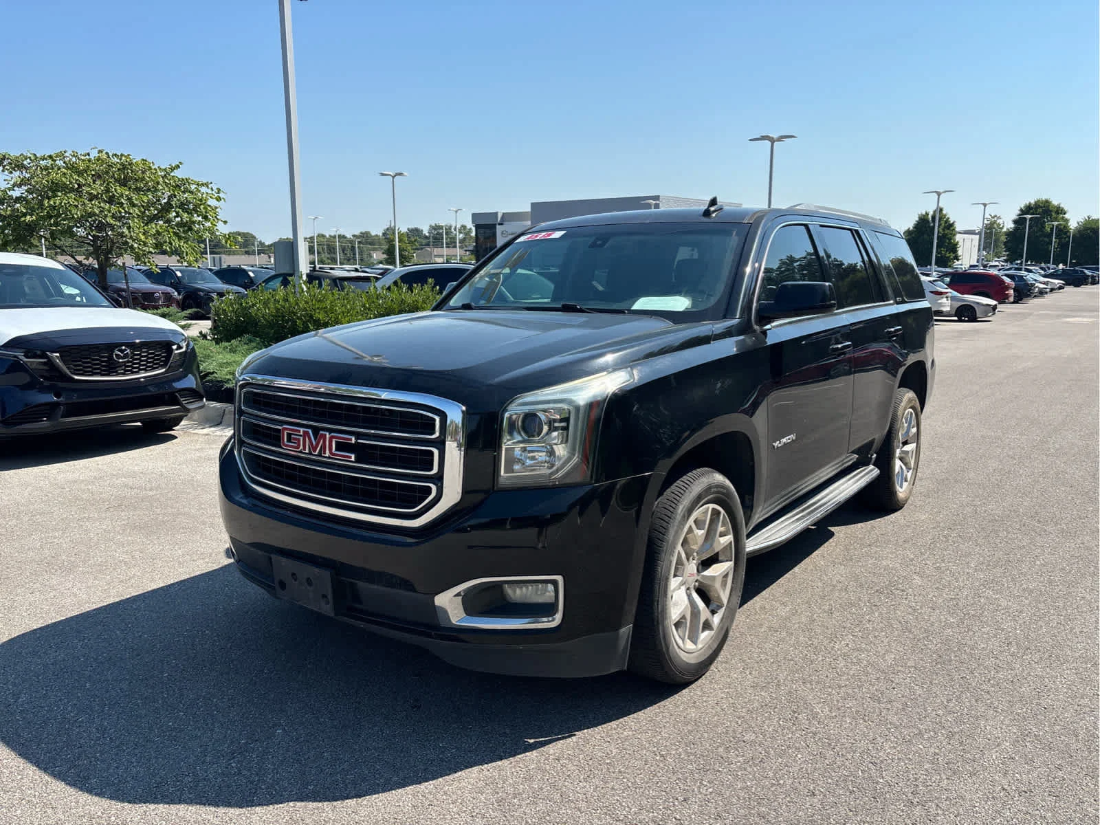 Used 2017 GMC Yukon SLE with VIN 1GKS1AKC1HR219595 for sale in Kansas City