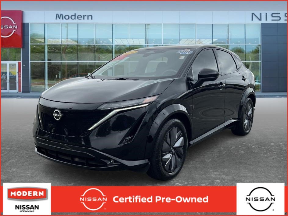 Used 2024 Black Diamond Pearl Nissan EVOLVE+ image 1
