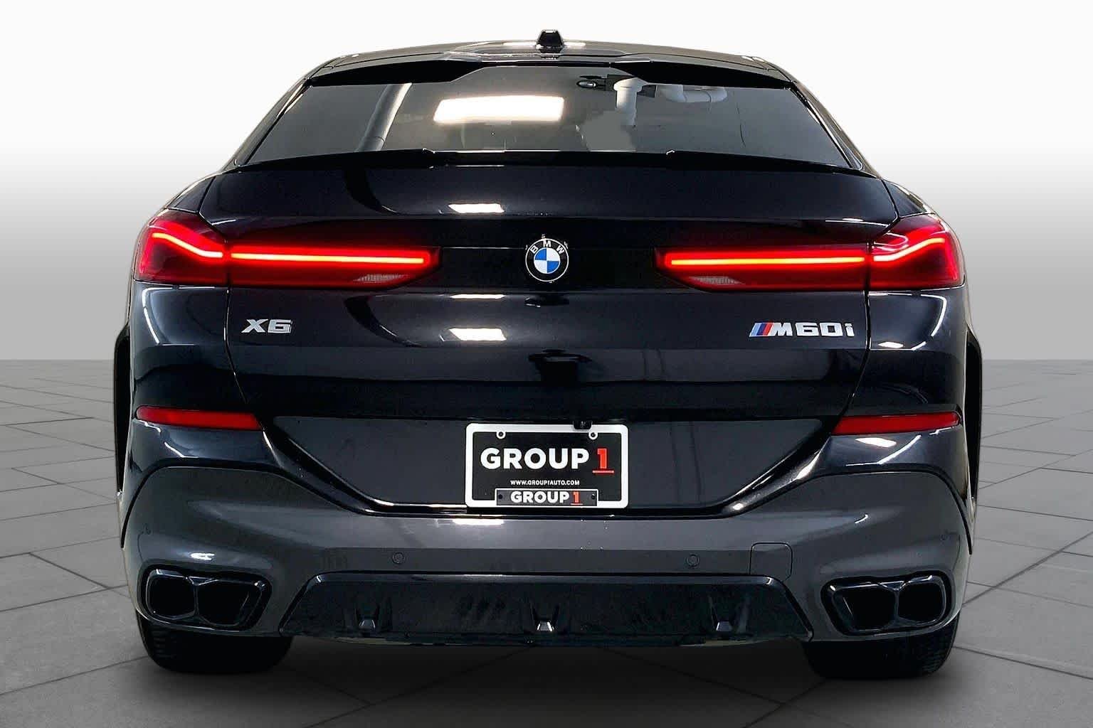 Used 2024 Black Sapphire Metallic BMW M60i image 4