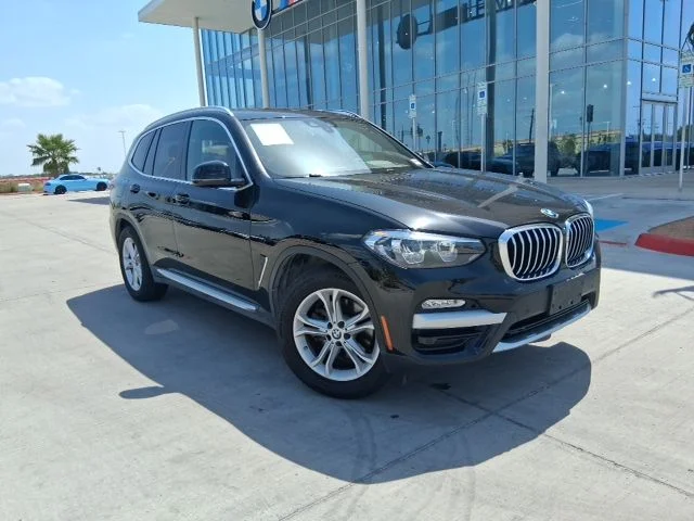 Used 2019 Black BMW sDrive30i image 1