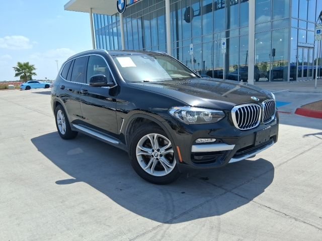 Used 2019 Black BMW sDrive30i image 1