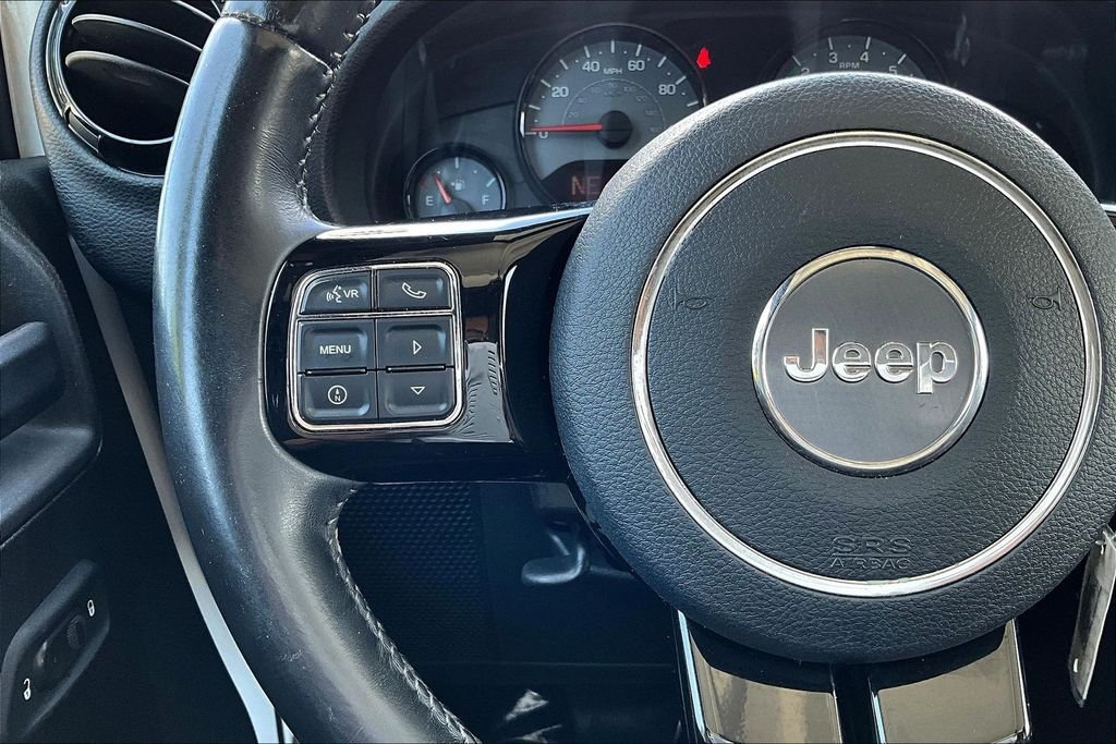 Used 2016 White Jeep Unlimited Sahara image 9