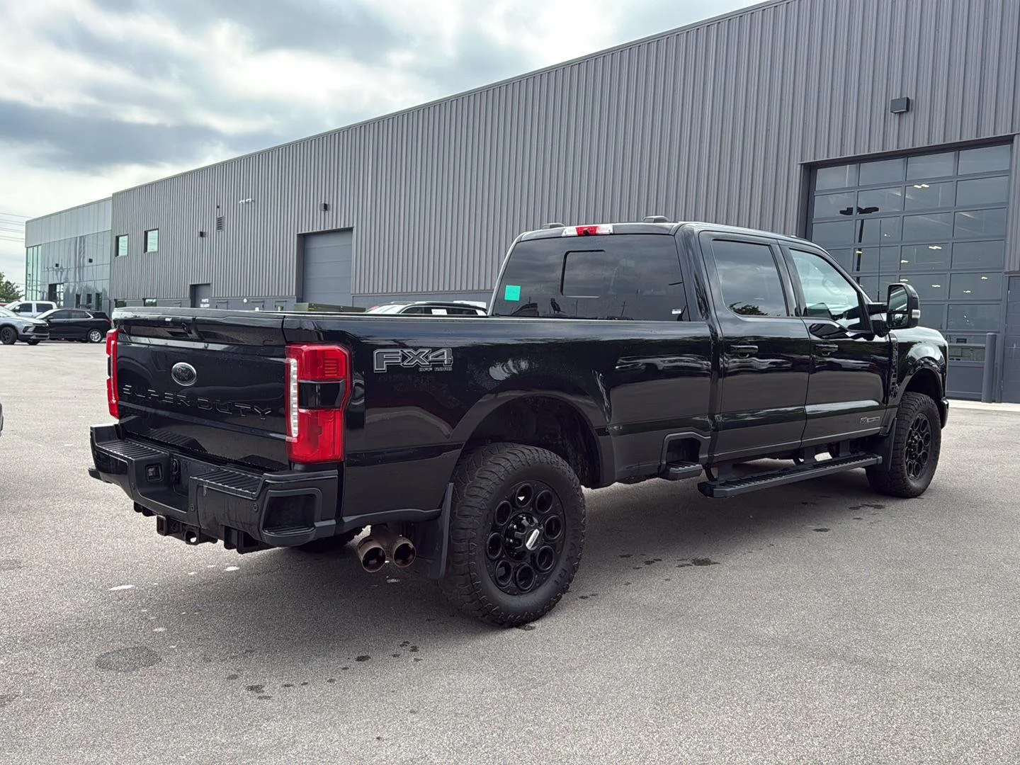 Used 2024 Agate Black Metallic Ford Lariat image 3