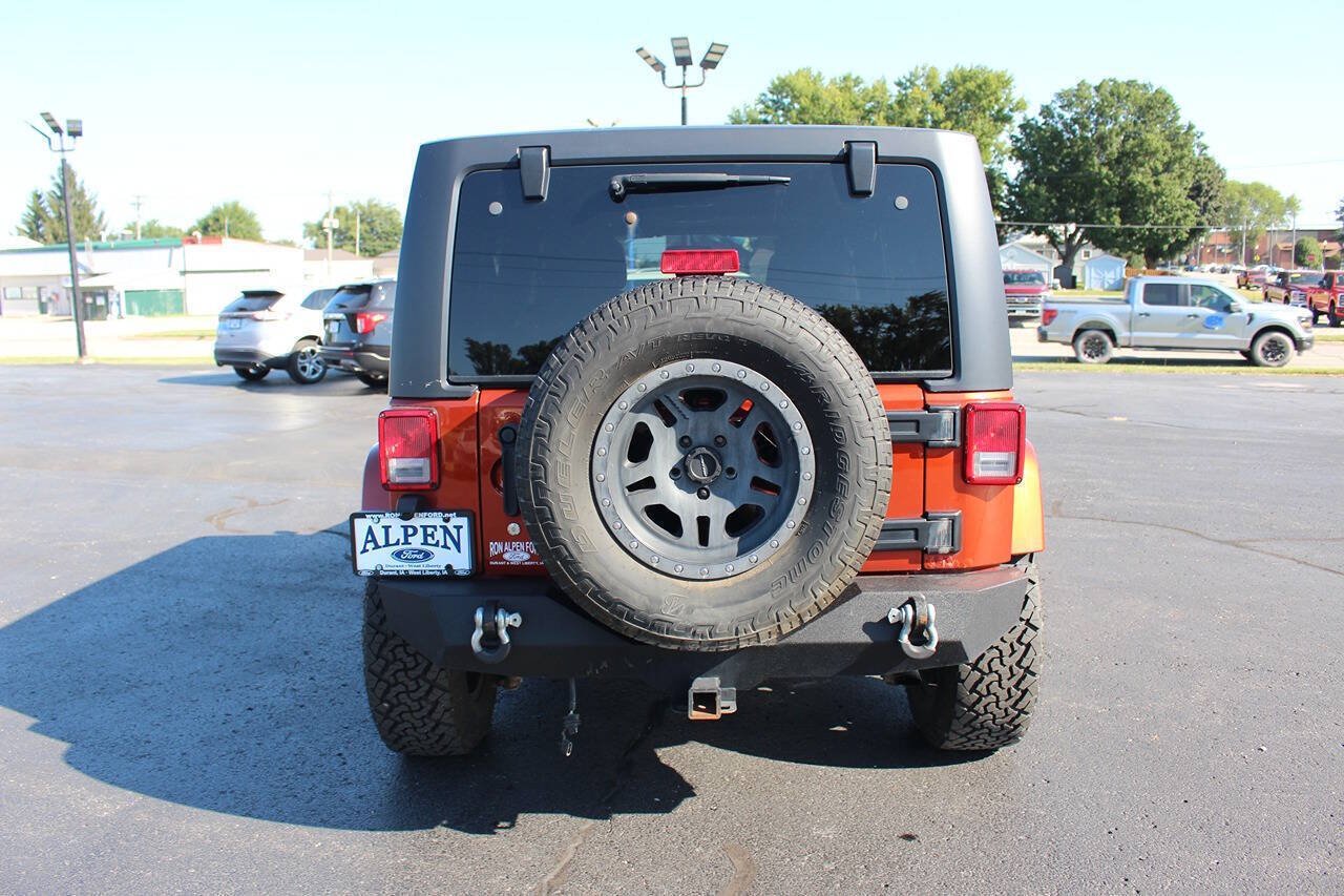 Used 2014 Copperhead Pearl Coat Jeep Sahara 4x4 4dr SUV image 6
