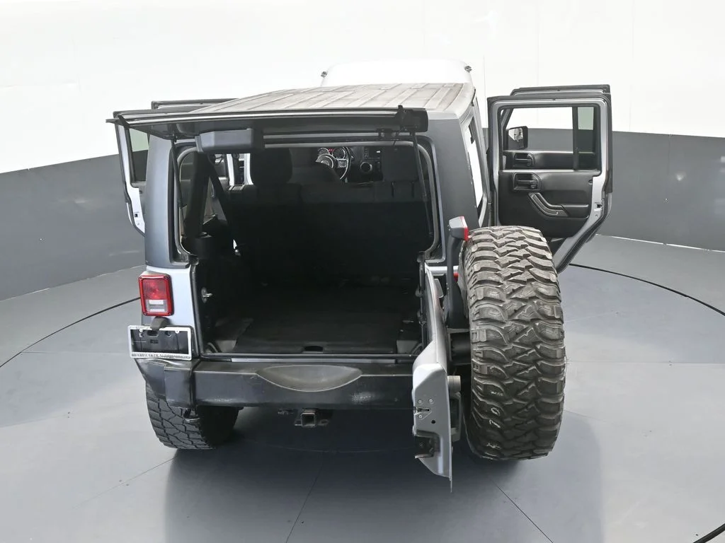 Used 2016 Billet Silver Metallic Clearcoat Jeep Unlimited Sport image 66