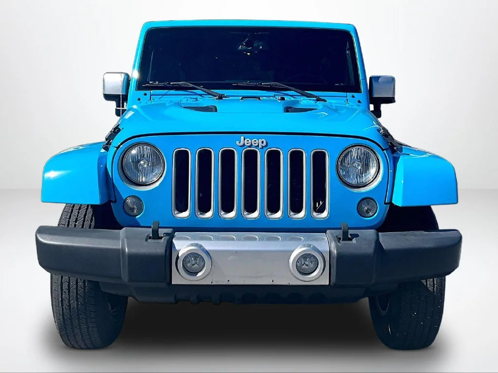 Used 2017 Blue Jeep Unlimited Sahara image 4