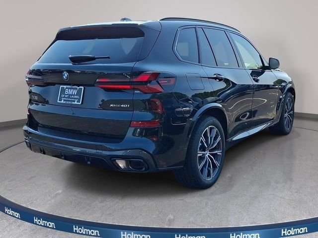 New 2026 Black Sapphire Metallic BMW xDrive40i image 4