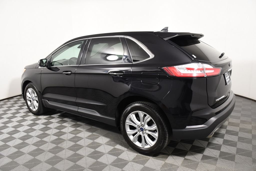 Used 2022 Agate Black Metallic Ford Titanium image 3