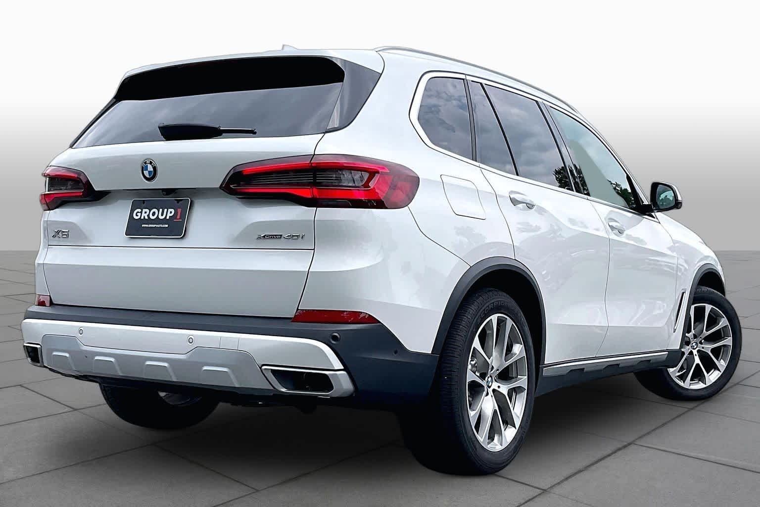 Used 2022 Mineral White Metallic BMW xDrive40i image 12