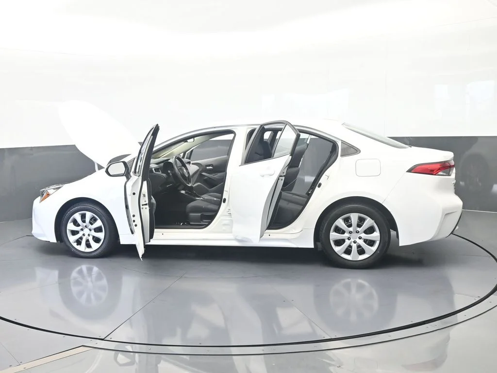 Used 2021 Super White Toyota LE image 62
