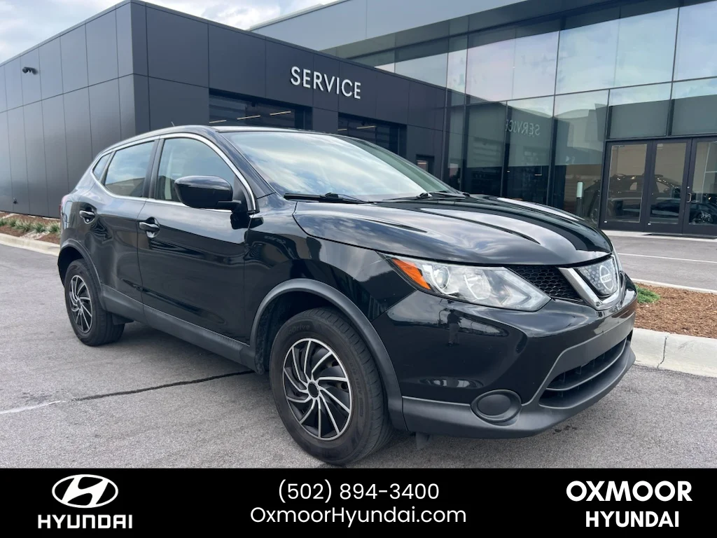 Used 2018 Magnetic Black Nissan S image 1
