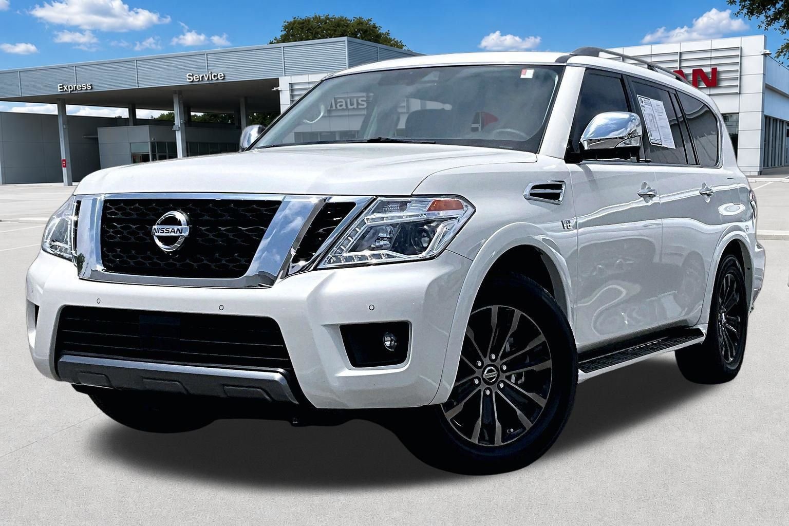 Used 2019 Pearl White Nissan Platinum image 3