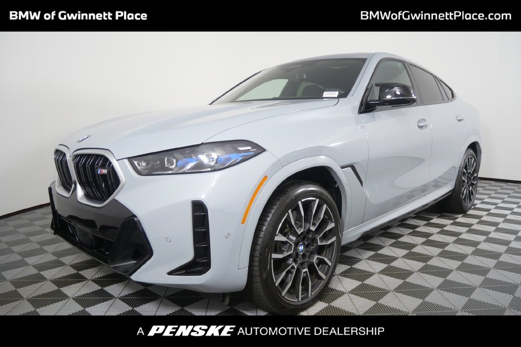 Certified Used 2026 Gray Metallic BMW M60i image 1