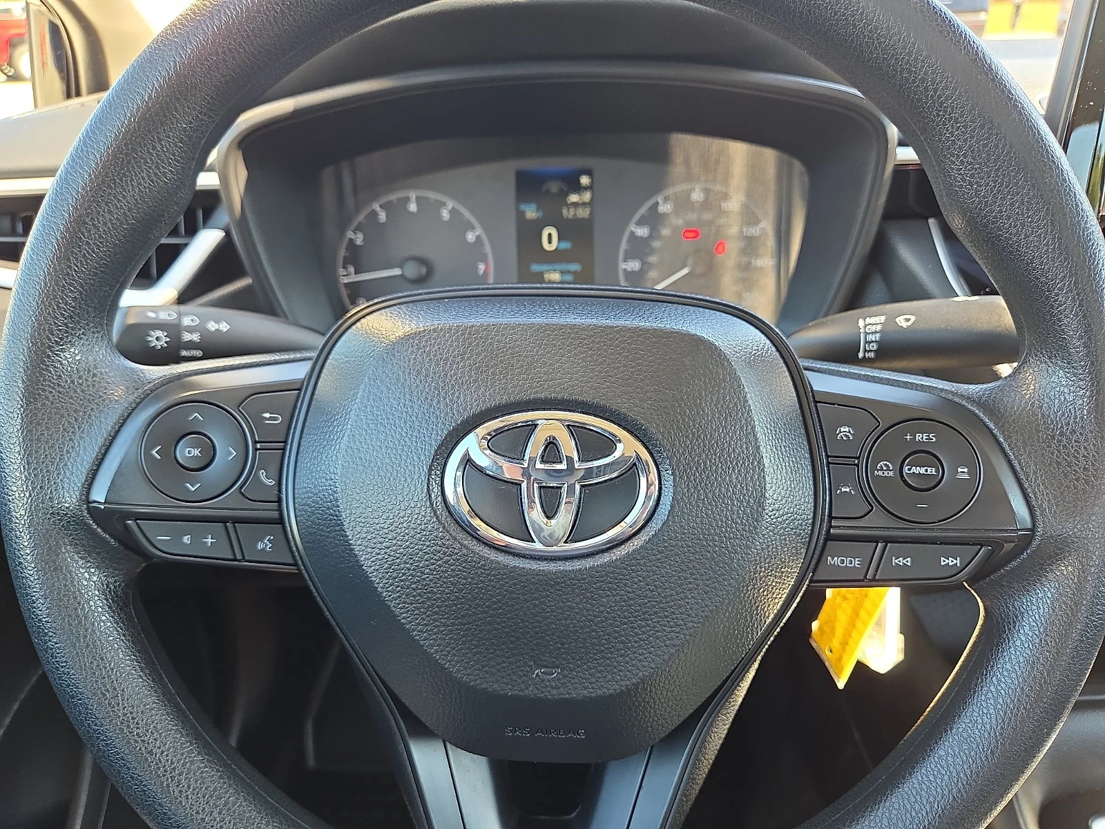 Used 2025 Midnight Black Metallic Toyota LE image 24