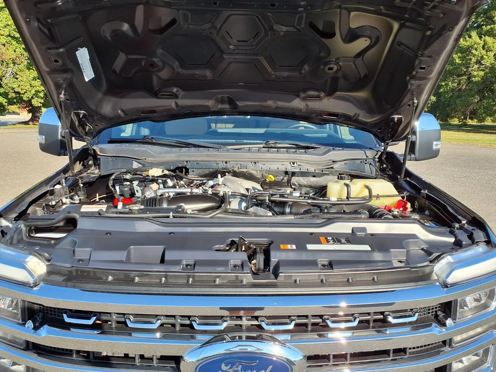 Used 2024 Antimatter Blue Metallic Ford LARIAT image 28