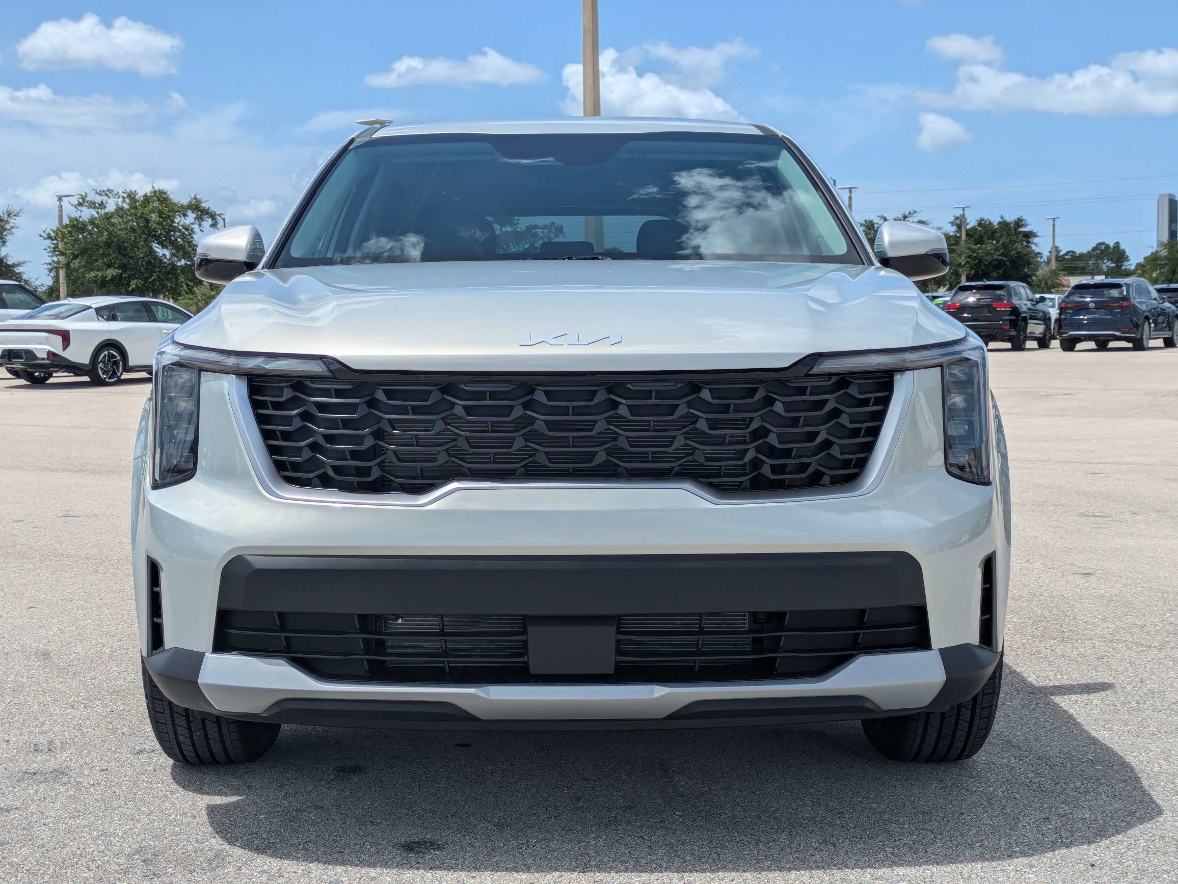 New 2026 Ivory Silver Kia LX image 3