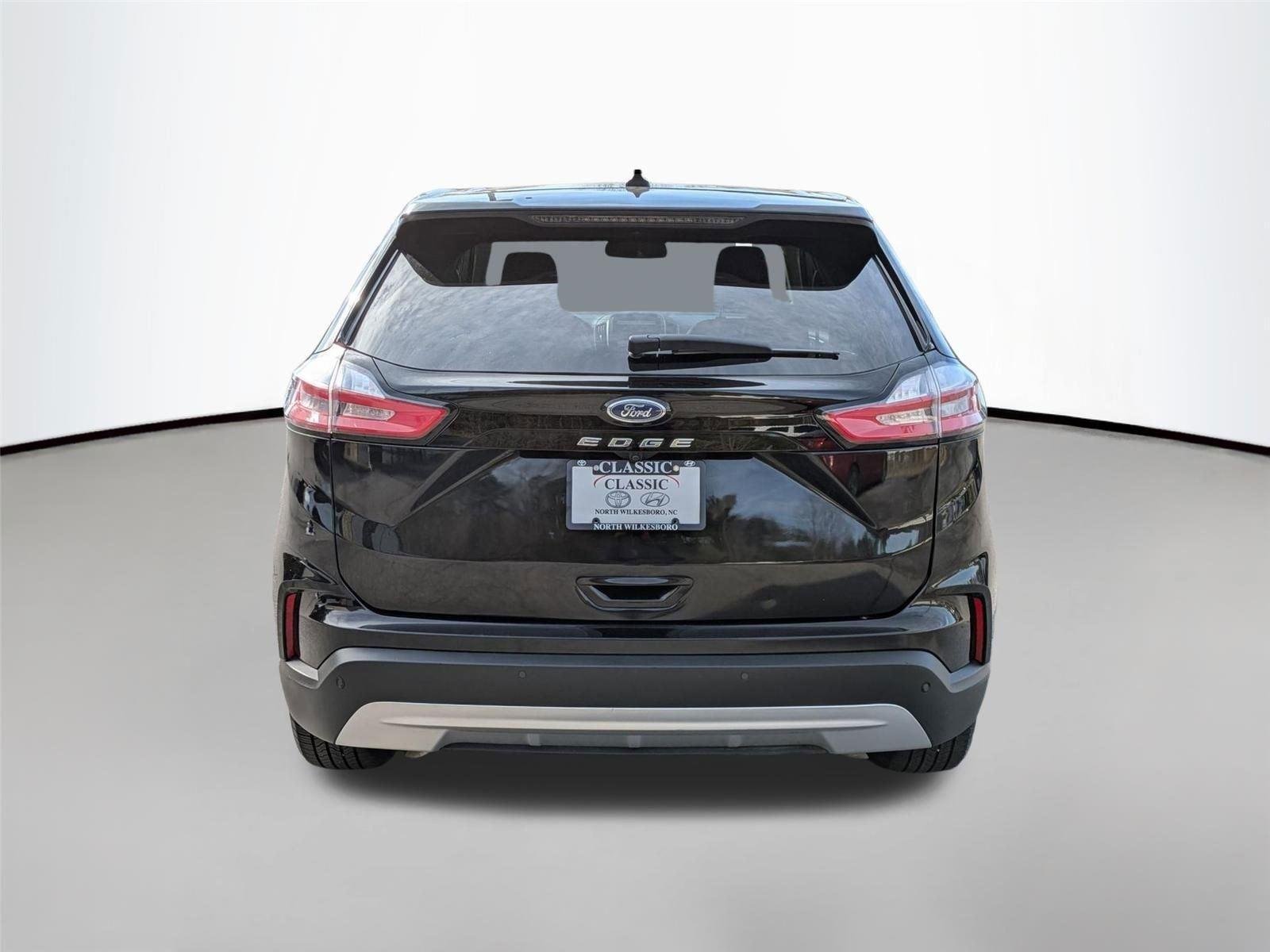 Used 2024 Agate Black Metallic Ford SEL image 6