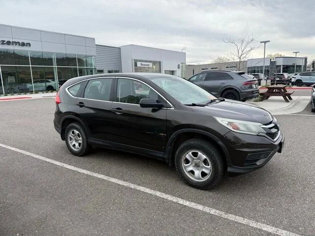 Used 2015 Honda CR-V LX with VIN 2HKRM4H3XFH629651 for sale in Bozeman, MT