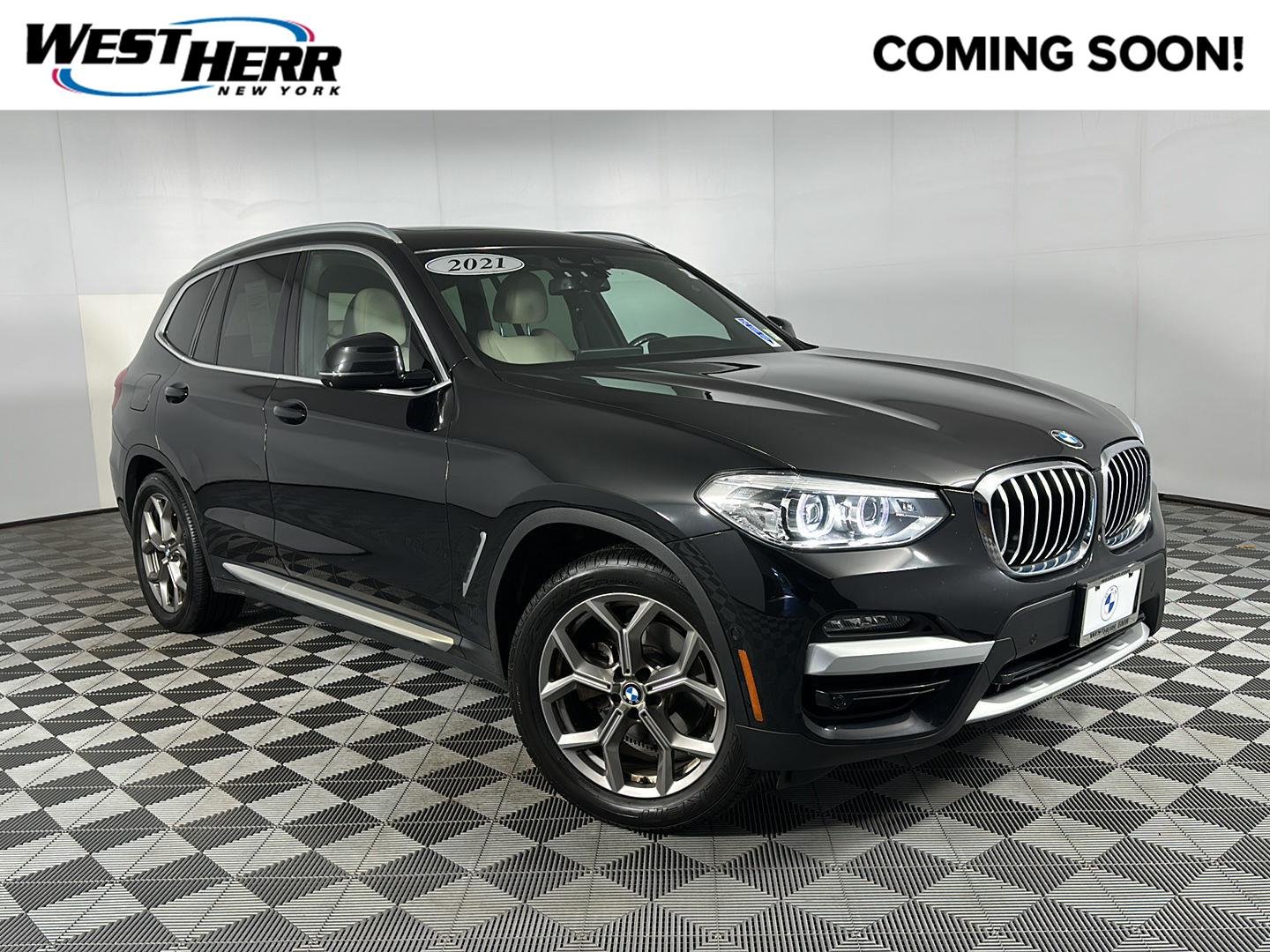 Used 2021 Black Sapphire Metallic BMW xDrive30i image 1