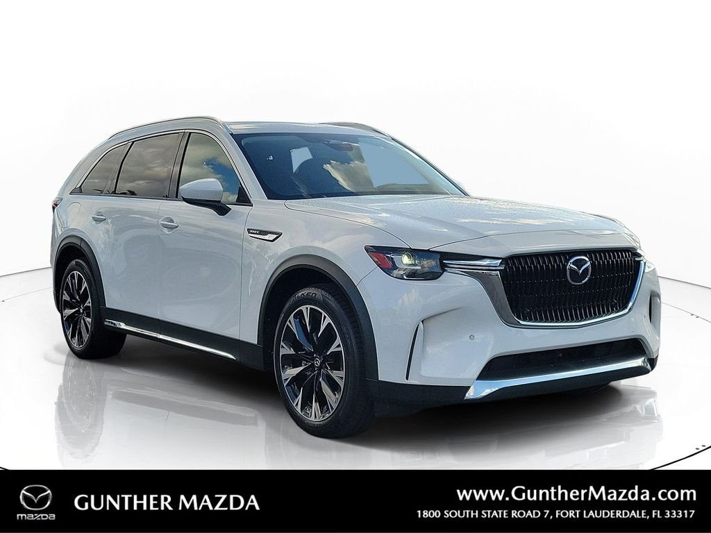 Used 2024 White Mazda Premium image 1