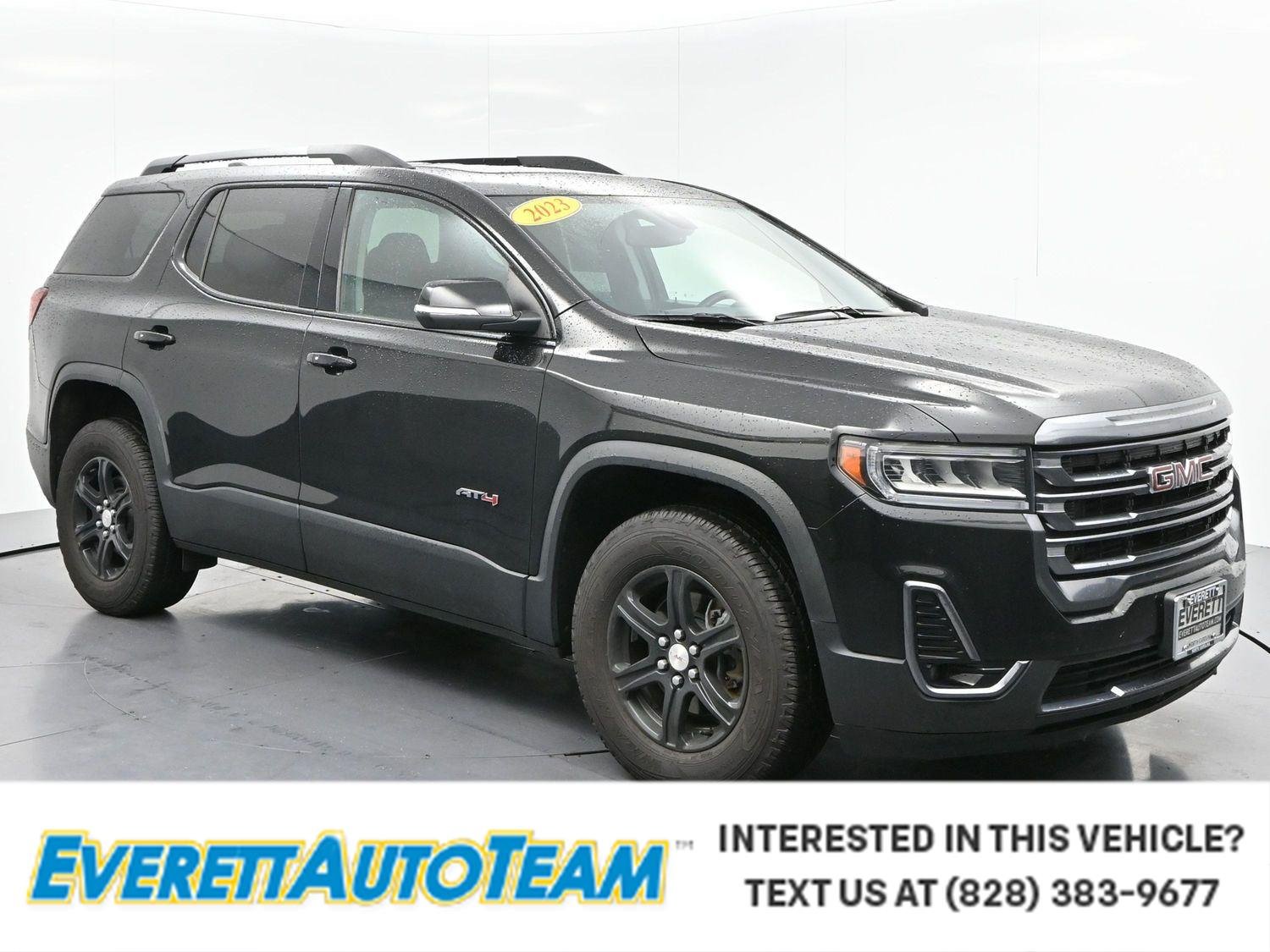 Used 2023 Ebony Twilight Metallic GMC AT4 image 1