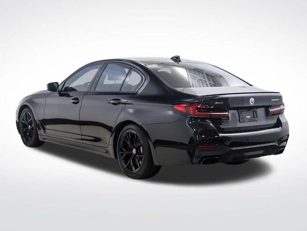 Certified Used 2023 Black Sapphire Metallic BMW M550i xDrive image 3