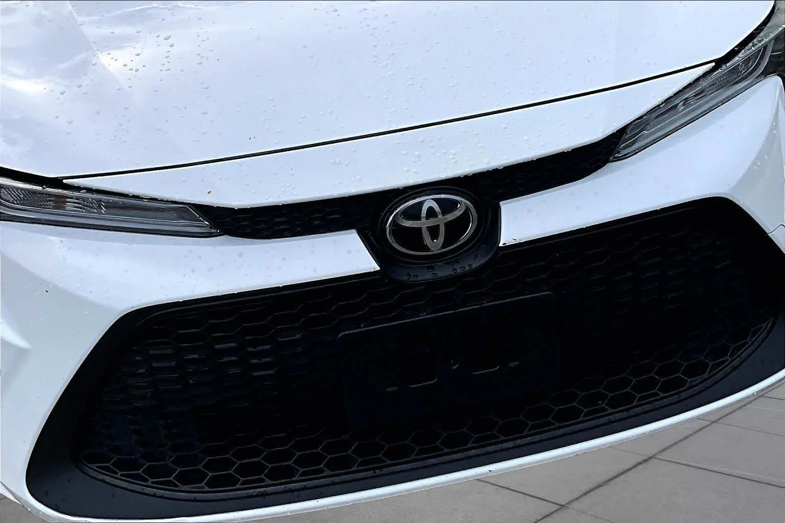 Used 2021 Super White Toyota LE image 30