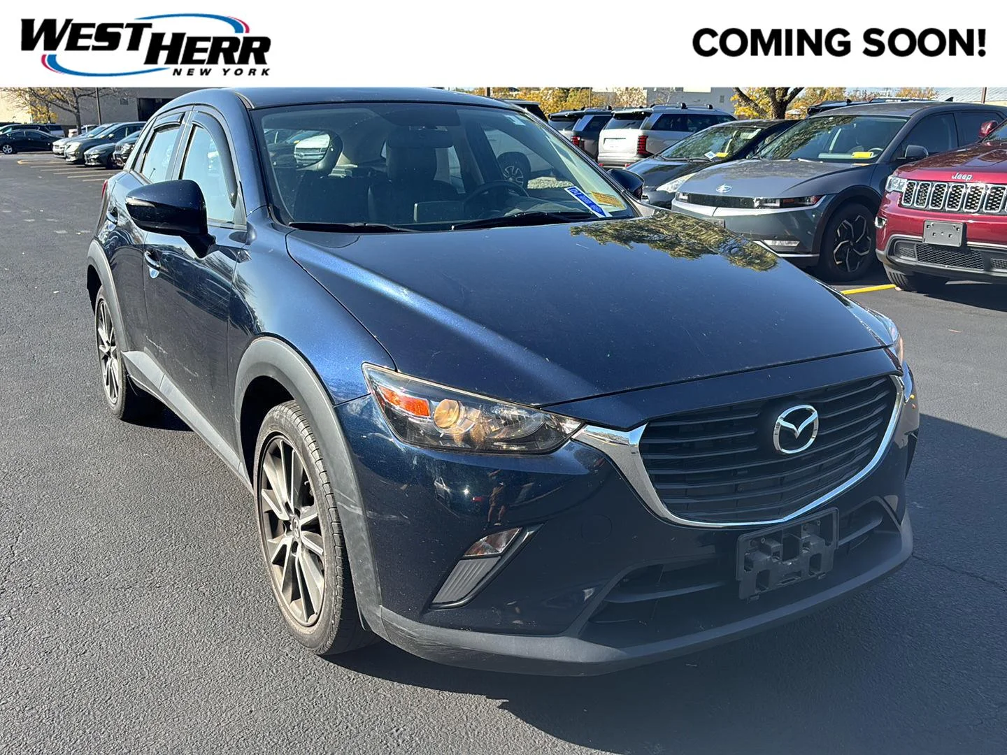 Used 2017 Deep Crystal Blue Mica Mazda Touring image 1
