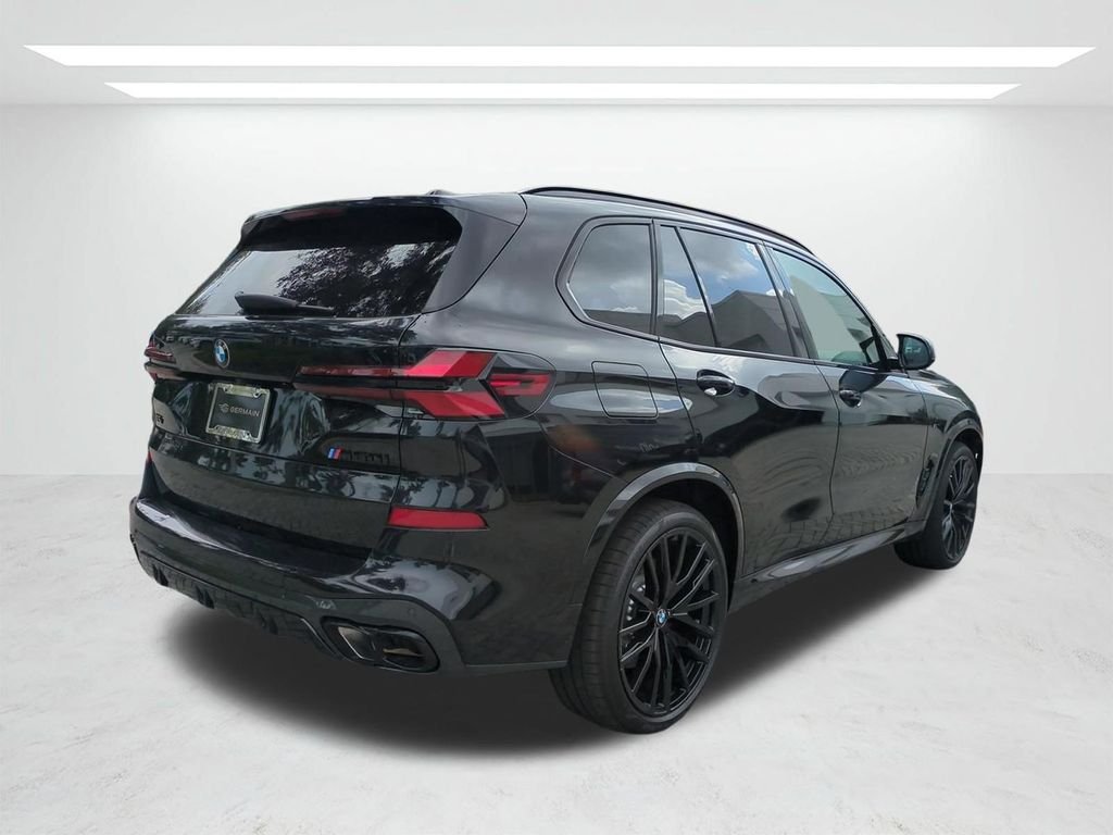 New 2026 Black Sapphire Metallic BMW M60i image 4