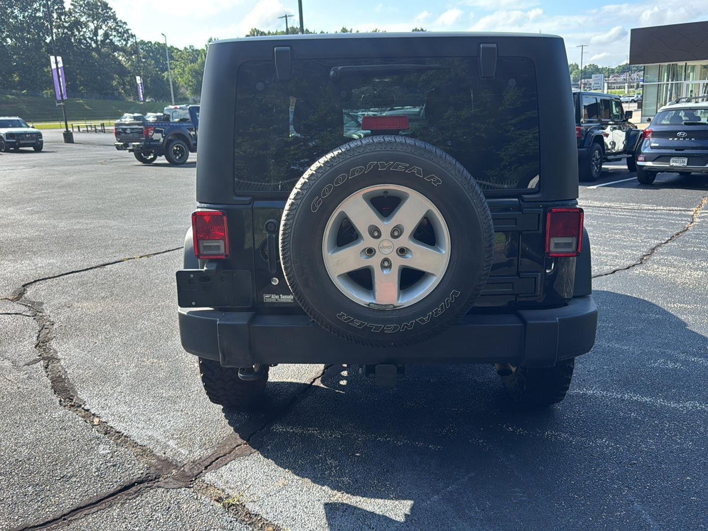 Used 2016 Black Clearcoat Jeep Sport image 4