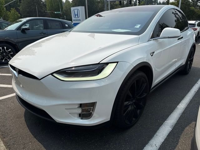 Used 2016 Solid White Tesla  image 2