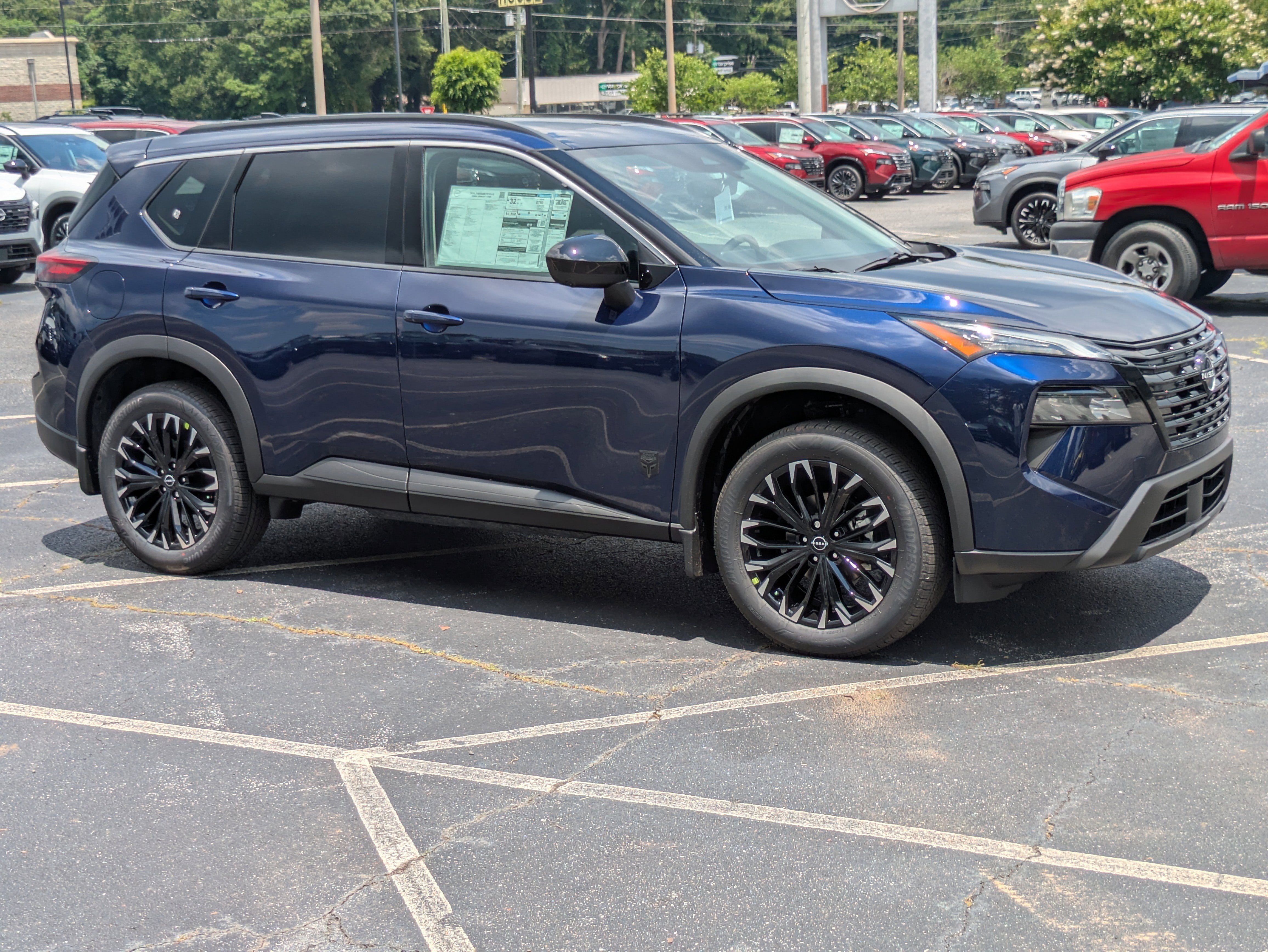 New 2026 Blue Nissan Dark Armor image 1