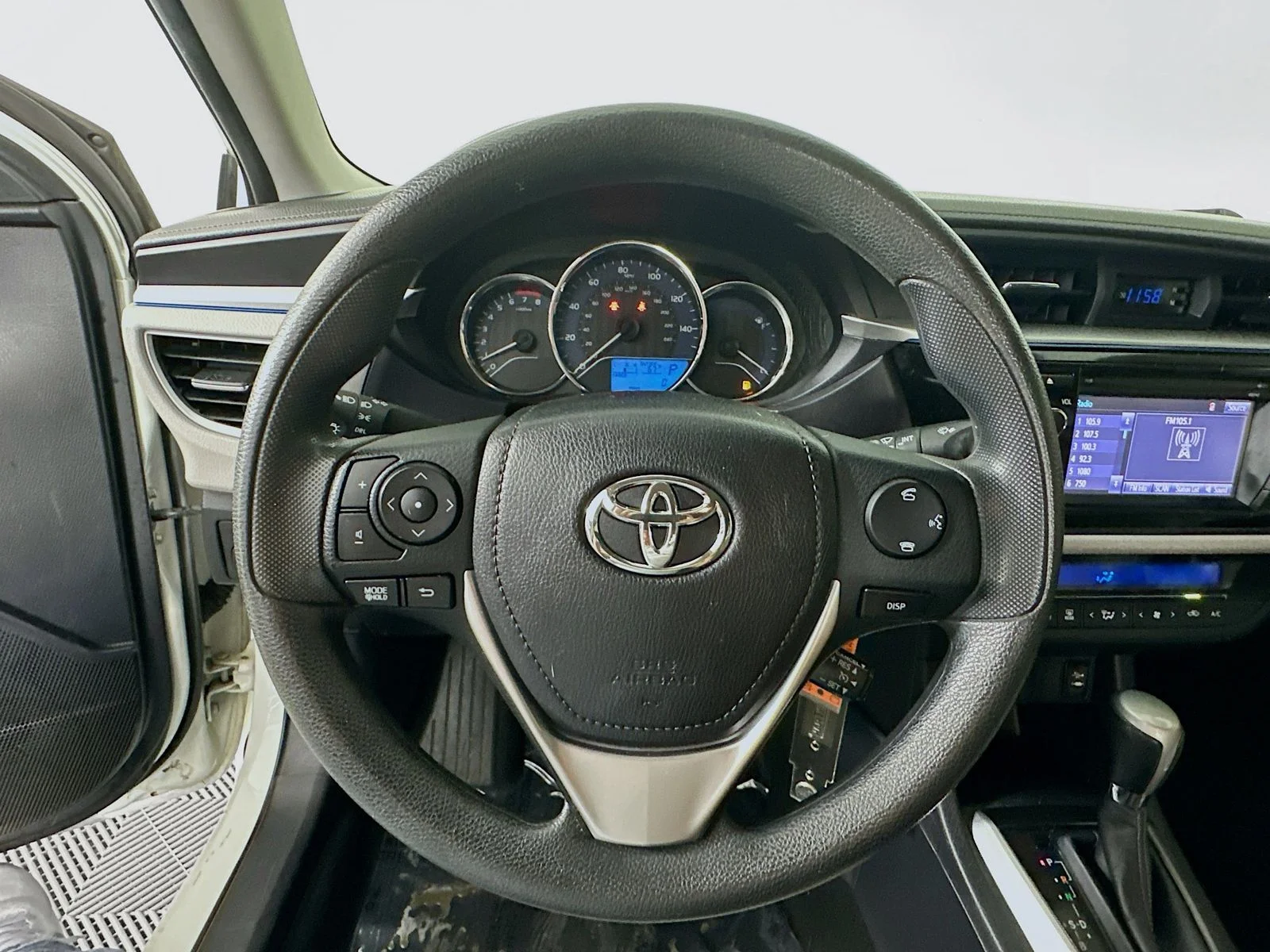Used 2015 Super White Toyota LE image 12